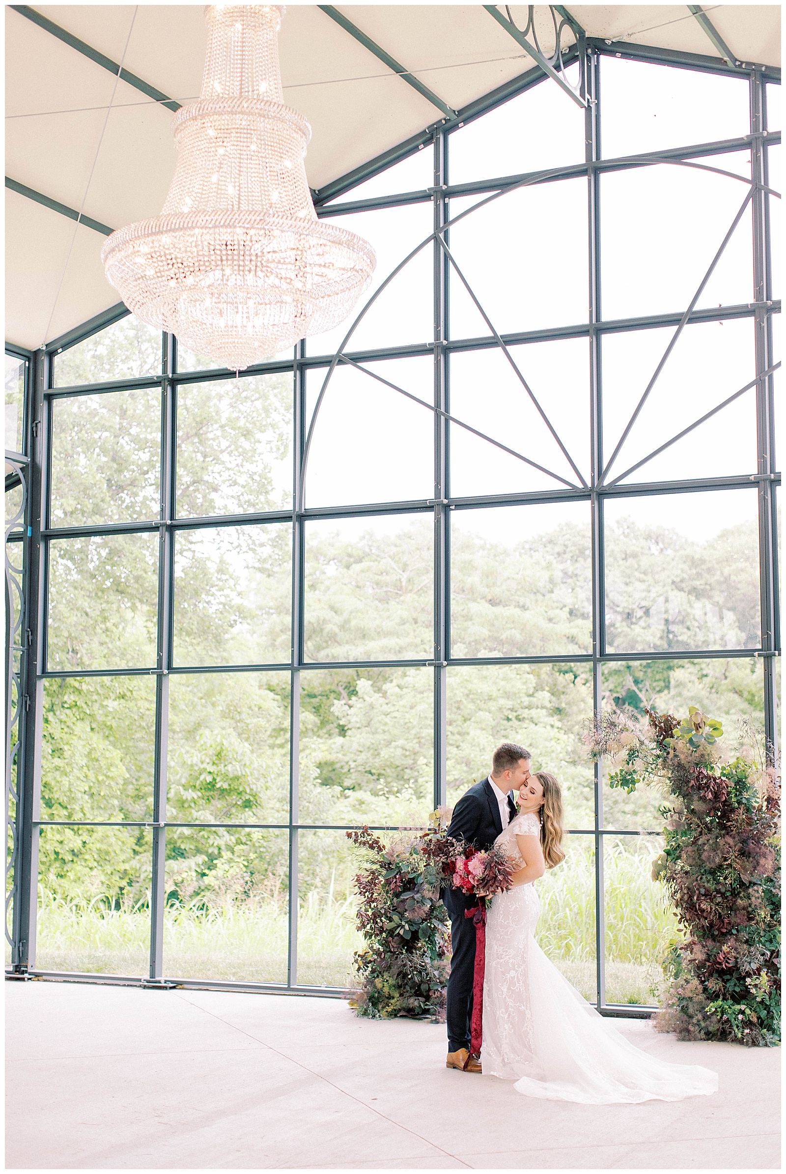 Beautiful chandelier with bride and groom floral wedding altar A-Vent Space