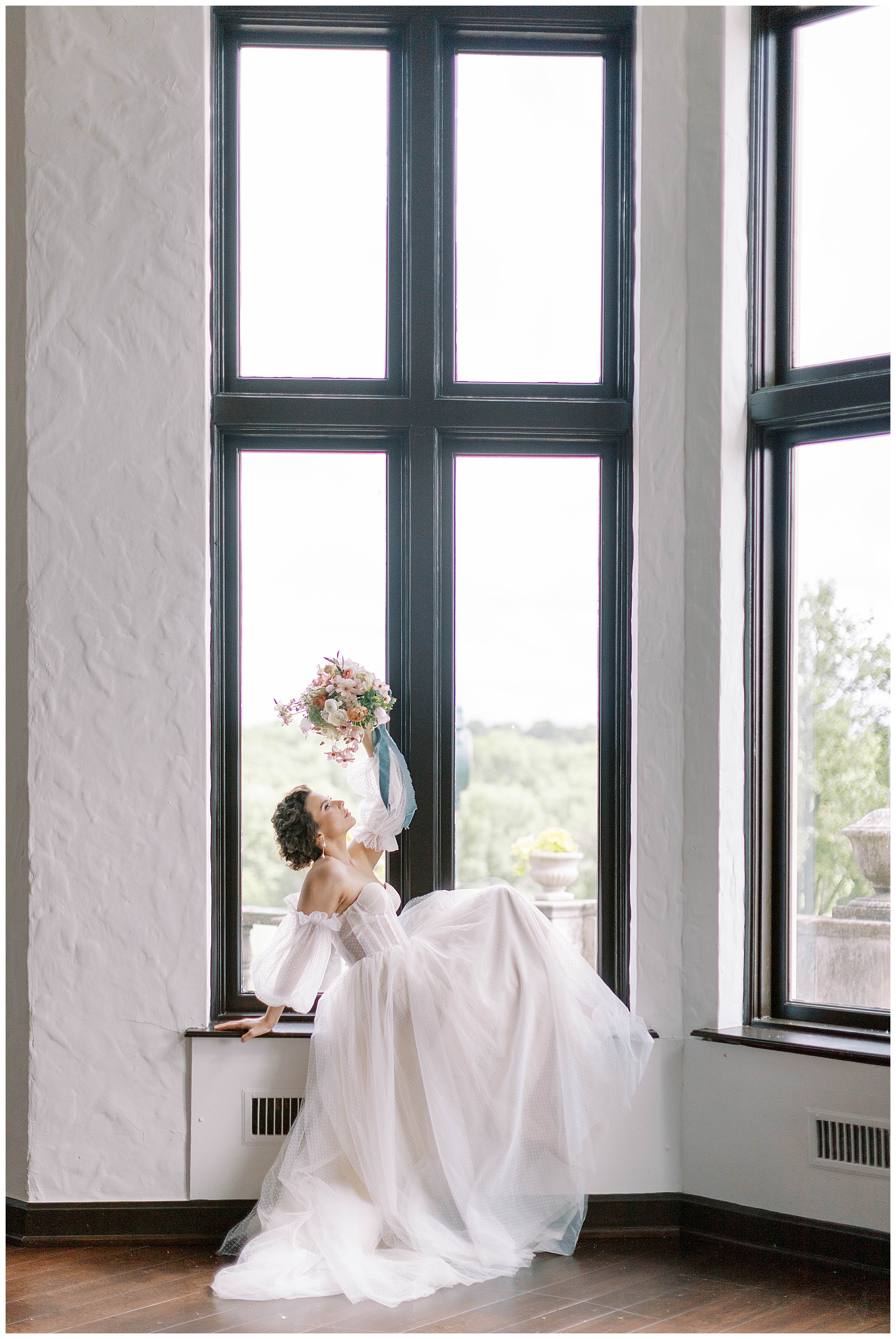 fine art inspired bridal portrait with bouquet dusty blue and peach at oakwood country club